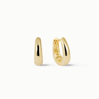 gold chunky huggie hoop earrings front view